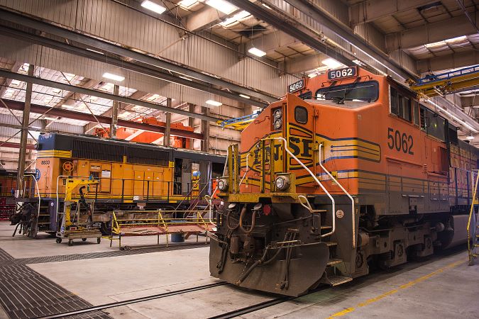 Two locomotives await repair in the diesel shop at Barstow